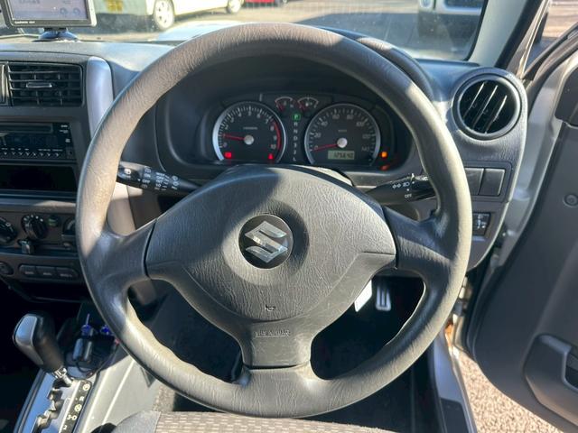 ジムニー ＸＧ　エアコン　４ＷＤ　パワーステアリング　パワーウインドウ　ライトレベライザー　補助ミラー　１６インチタイヤ　スペアタイヤ　リアワイパー（21枚目）