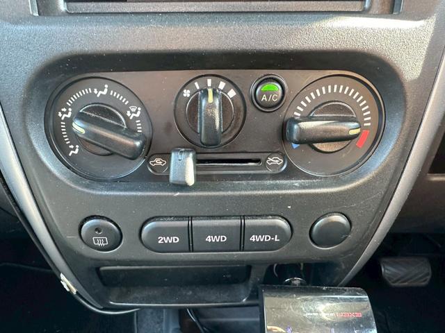 ジムニー ＸＧ　エアコン　４ＷＤ　パワーステアリング　パワーウインドウ　ライトレベライザー　補助ミラー　１６インチタイヤ　スペアタイヤ　リアワイパー（26枚目）