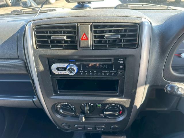 ジムニー ＸＧ　エアコン　４ＷＤ　パワーステアリング　パワーウインドウ　ライトレベライザー　補助ミラー　１６インチタイヤ　スペアタイヤ　リアワイパー（27枚目）