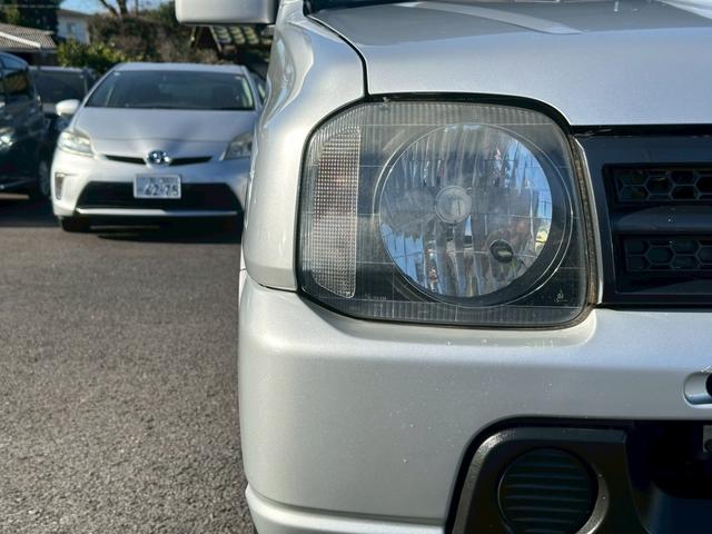 ジムニー ＸＧ　エアコン　４ＷＤ　パワーステアリング　パワーウインドウ　ライトレベライザー　補助ミラー　１６インチタイヤ　スペアタイヤ　リアワイパー（33枚目）