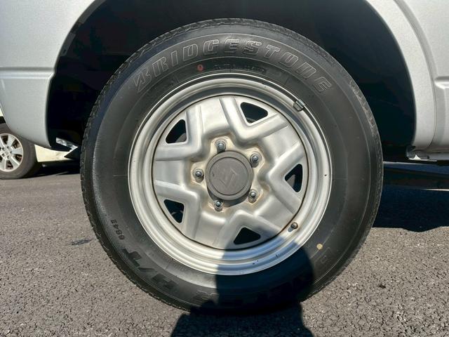 ジムニー ＸＧ　エアコン　４ＷＤ　パワーステアリング　パワーウインドウ　ライトレベライザー　補助ミラー　１６インチタイヤ　スペアタイヤ　リアワイパー（43枚目）