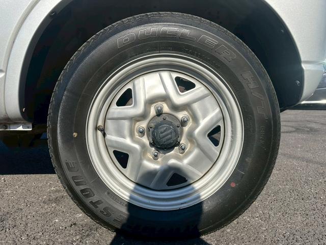 ジムニー ＸＧ　エアコン　４ＷＤ　パワーステアリング　パワーウインドウ　ライトレベライザー　補助ミラー　１６インチタイヤ　スペアタイヤ　リアワイパー（44枚目）