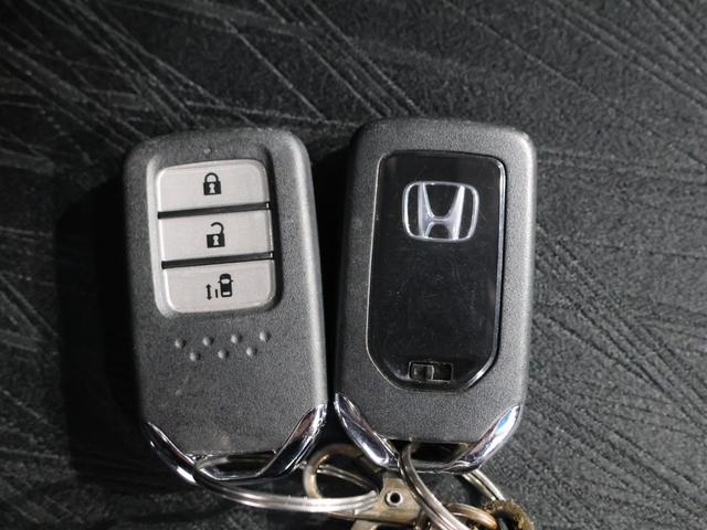 オデッセイ アブソルート　雹災車　あんしんパッケージ　ＬＥＤヘッドライト　左側電動スライドドア　２列目プレミアムクレイドルシート　純正ナビ　Ｂｌｕｅｔｏｏｔｈ接続　リア席モニター　ＥＴＣ　１８インチアルミホイール　Ｒカメ　ＡＣ（20枚目）