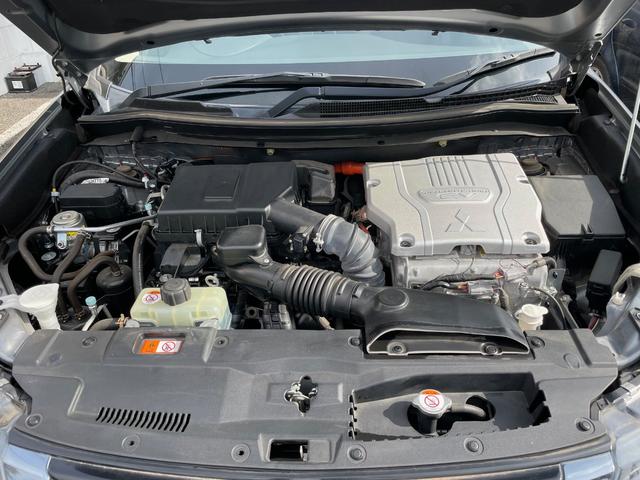 アウトランダーPHEV Gプレミアムパッケージ 黒皮レザーシート マルチアラウンドモニター 純正ナビ フルセグ バックカメラ パドルシフト 100VAC電源 スマートキー ETC パドルシフト パワーバックドア ステアリングヒーター デイライト(32枚目)