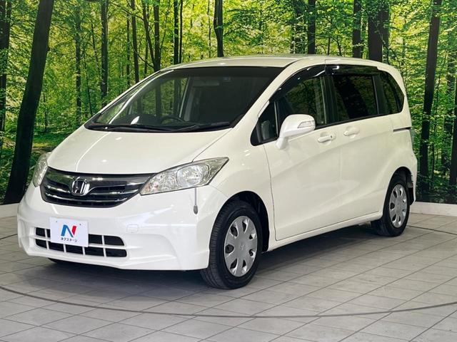 フリード Ｇ　ジャストセレクション　電動スライドドア　純正ナビ　禁煙車　ドラレコ　スマートキー　ＥＴＣ　オートエアコン　ＣＤ再生　電動格納ミラー　イモビライザー　衝突安全ボディ（22枚目）