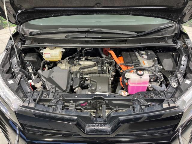 ヴォクシー ハイブリッドＺＳ　煌ＩＩＩ　後期　両側電動スライド　純正９型ナビ　後席モニター　バックカメラ　セーフティセンス　禁煙車　ハーフレザーシート　ドラレコ　スマートキー　ＥＴＣ　ＬＥＤヘッド　オートライト　オートエアコン（19枚目）