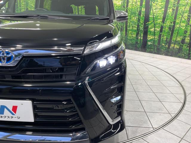 ヴォクシー ハイブリッドＺＳ　煌ＩＩＩ　後期　両側電動スライド　純正９型ナビ　後席モニター　バックカメラ　セーフティセンス　禁煙車　ハーフレザーシート　ドラレコ　スマートキー　ＥＴＣ　ＬＥＤヘッド　オートライト　オートエアコン（33枚目）