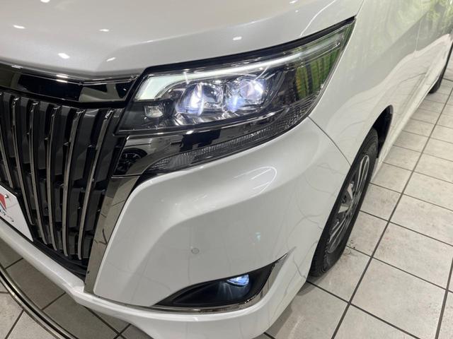 エスクァイア Gi プレミアムパッケージ ブラックテーラード 後期 両側電動スライド BIG-X9型ナビ 後席モニター バックカメラ セーフティセンス 禁煙車 ETC ドラレコ スマートキー シートヒーター ハーフレザーシート LEDヘッド オートライト(27枚目)