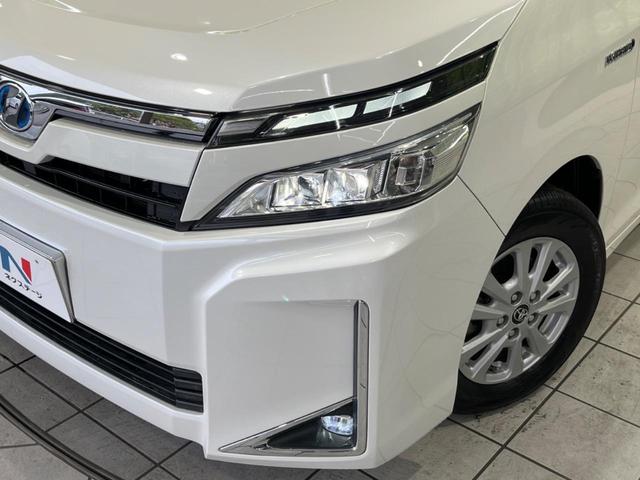 ヴォクシー ハイブリッドV 後期 両側電動スライド 純正10型ナビ 後席モニター バックカメラ セーフティセンス AC100V電源 禁煙車 クルコン ETC2.0 ドラレコ スマートキー LEDヘッド オートライト(26枚目)