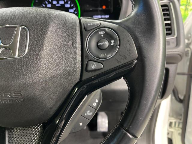 ヴェゼル ハイブリッドZ・ホンダセンシング 純正SDナビ バックカメラ ホンダセンシング アダプティブクルーズ 禁煙車 ハーフレザーシート スマートキー LEDヘッド/フォグ オートライト ルーフレール ETC クルコン 純正17インチAW(6枚目)