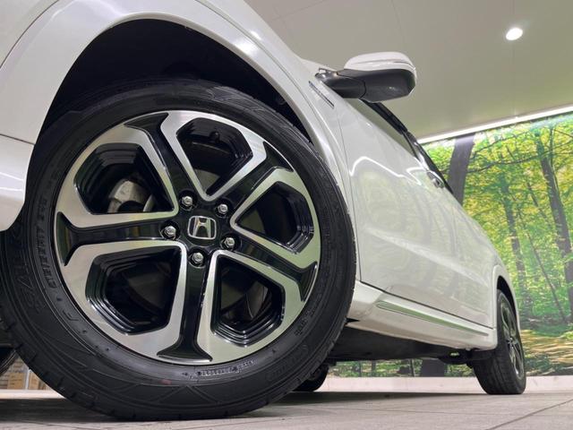 ヴェゼル ハイブリッドZ・ホンダセンシング 純正SDナビ バックカメラ ホンダセンシング アダプティブクルーズ 禁煙車 ハーフレザーシート スマートキー LEDヘッド/フォグ オートライト ルーフレール ETC クルコン 純正17インチAW(13枚目)