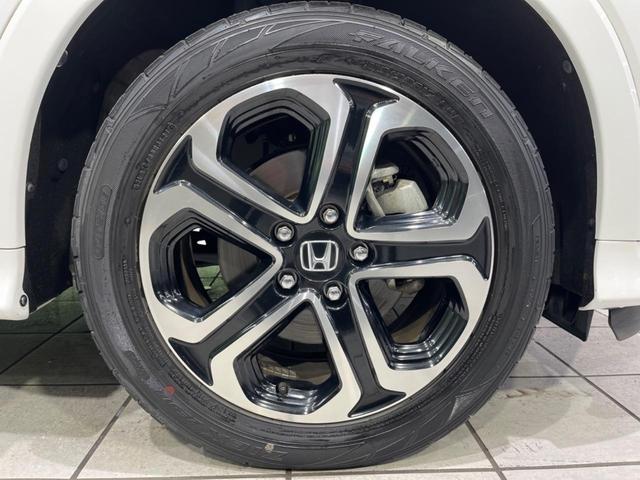 ヴェゼル ハイブリッドZ・ホンダセンシング 純正SDナビ バックカメラ ホンダセンシング アダプティブクルーズ 禁煙車 ハーフレザーシート スマートキー LEDヘッド/フォグ オートライト ルーフレール ETC クルコン 純正17インチAW(27枚目)