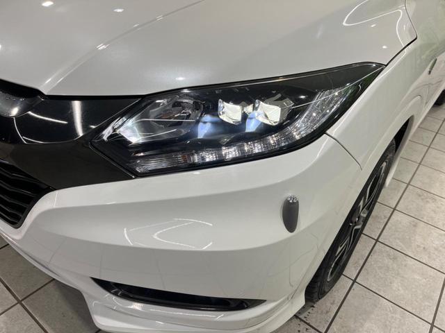 ヴェゼル ハイブリッドZ・ホンダセンシング 純正SDナビ バックカメラ ホンダセンシング アダプティブクルーズ 禁煙車 ハーフレザーシート スマートキー LEDヘッド/フォグ オートライト ルーフレール ETC クルコン 純正17インチAW(30枚目)
