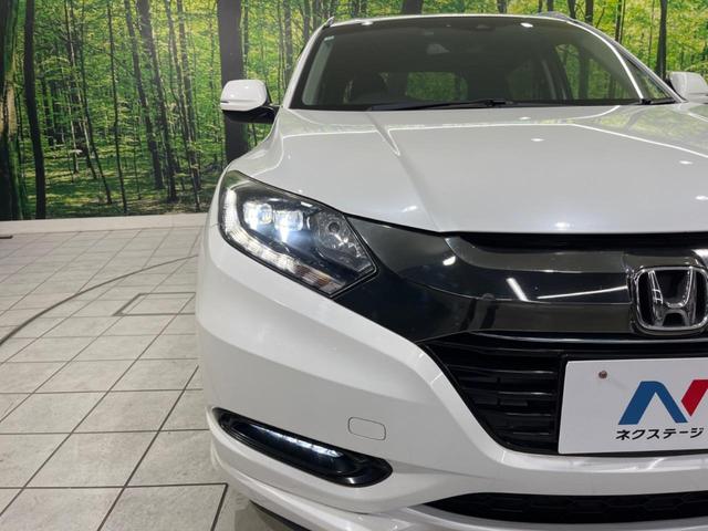 ヴェゼル ハイブリッドZ・ホンダセンシング 純正SDナビ バックカメラ ホンダセンシング アダプティブクルーズ 禁煙車 ハーフレザーシート スマートキー LEDヘッド/フォグ オートライト ルーフレール ETC クルコン 純正17インチAW(35枚目)