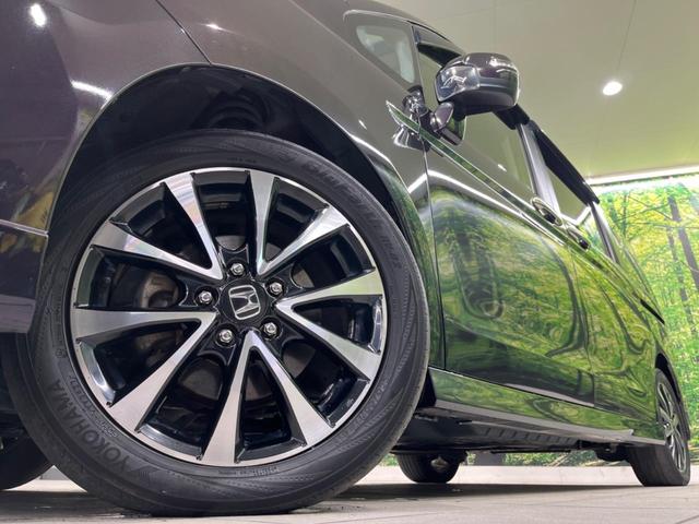 ステップワゴンスパーダ Z クールスピリット 両側電動スライド 純正ナビ バックカメラ 禁煙車 ハーフレザーシート スマートキー HIDヘッド ETC クルコン オートライト オートエアコン 純正17インチAW CD DVD再生 フルセグTV(14枚目)