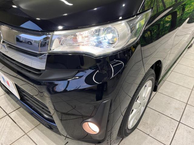 ｅＫカスタム Ｇ　純正ナビ　バックカメラ　禁煙車　ＥＴＣ　スマートキー　ＨＩＤヘッド　フォグランプ　オートエアコン　純正１４インチＡＷ　フルセグＴＶ　ＣＤ／ＡＵＸ再生　アイドリングストップ　電動格納ミラー（12枚目）