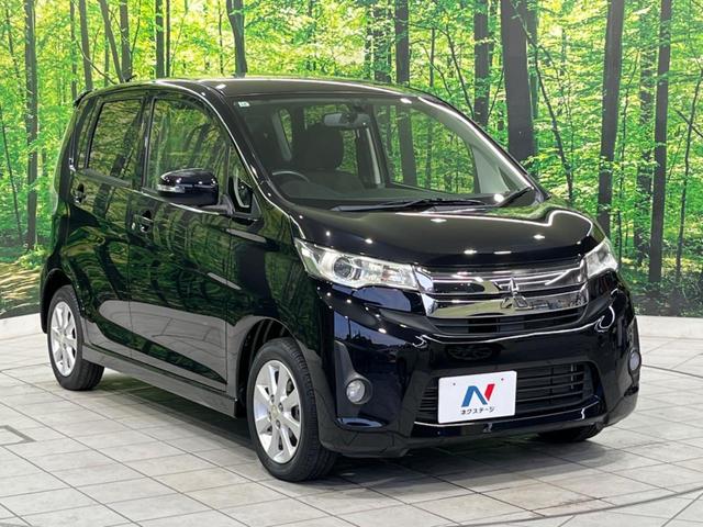 ｅＫカスタム Ｇ　純正ナビ　バックカメラ　禁煙車　ＥＴＣ　スマートキー　ＨＩＤヘッド　フォグランプ　オートエアコン　純正１４インチＡＷ　フルセグＴＶ　ＣＤ／ＡＵＸ再生　アイドリングストップ　電動格納ミラー（16枚目）