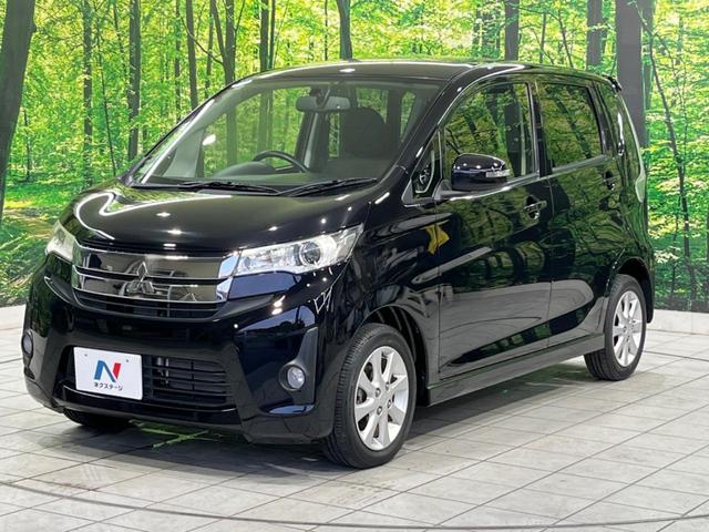 ｅＫカスタム Ｇ　純正ナビ　バックカメラ　禁煙車　ＥＴＣ　スマートキー　ＨＩＤヘッド　フォグランプ　オートエアコン　純正１４インチＡＷ　フルセグＴＶ　ＣＤ／ＡＵＸ再生　アイドリングストップ　電動格納ミラー（30枚目）