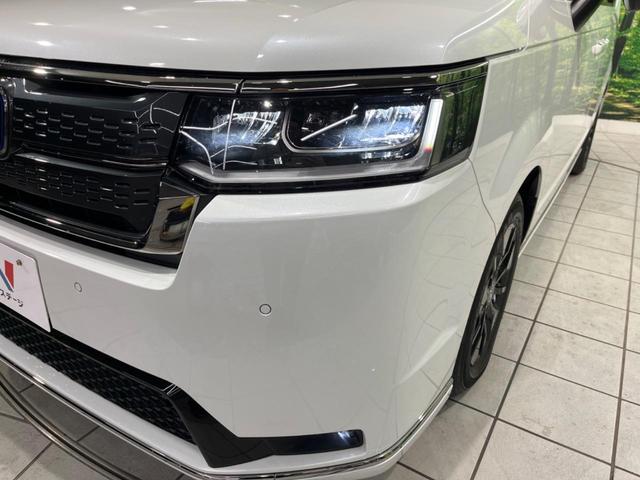 ステップワゴン ｅ：ＨＥＶスパーダ　両側電動ドア　純正ナビ　後席モニター　全周囲カメラ　ホンダセンシング　レーダークルーズ　禁煙車　電動リアゲート　ハーフレザーシート　シートヒーター　ドラレコ　コーナーセンサー　スマートキー（32枚目）