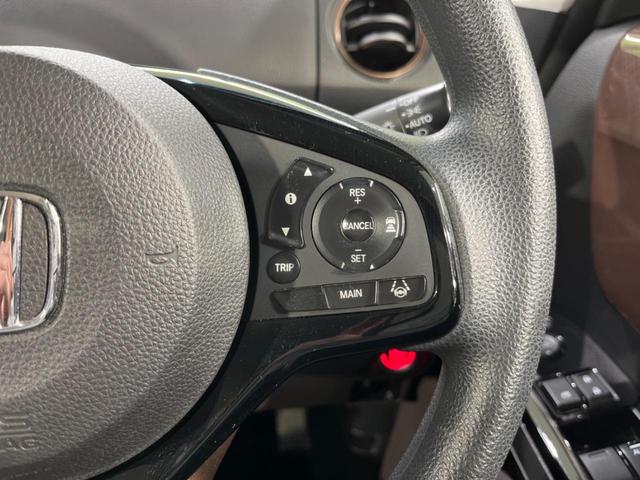 Ｎ－ＢＯＸ Ｇ・Ｌホンダセンシング　カッパーブラウンスタイル　純正ナビ　両側電動スライド　バックカメラ　ホンダセンシング　アダプティブクルーズ　禁煙車　スマートキー　ＬＥＤヘッド　オートライト　ＥＴＣ　純正１４インチＡＷ　オートエアコン　Ｂｌｕｅｔｏｏｔｈ再生（7枚目）