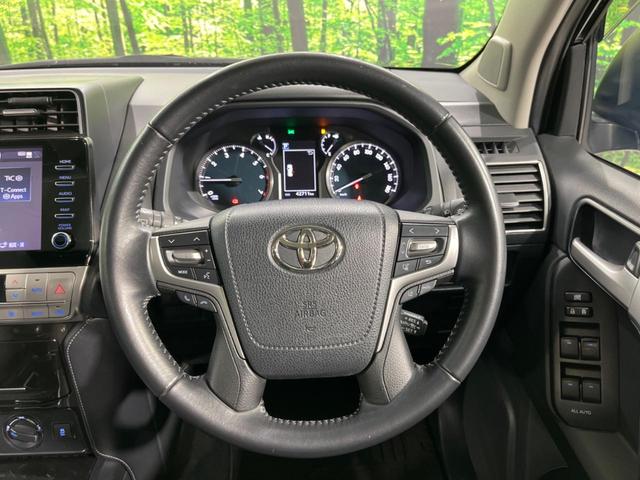 ランドクルーザープラド ＴＸ　Ｌパッケージ・ブラックエディション　後期　７人乗り　ムーンルーフ　純正９型ナビ　全周囲カメラ　セーフティセンス　禁煙車　黒革シート　シートベンチレーション　パワーシート　ＥＴＣ２．０　スマートキー　ＬＥＤヘッド　オートライト（12枚目）