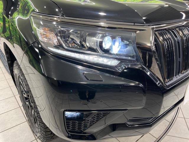 ランドクルーザープラド ＴＸ　Ｌパッケージ・ブラックエディション　後期　７人乗り　ムーンルーフ　純正９型ナビ　全周囲カメラ　セーフティセンス　禁煙車　黒革シート　シートベンチレーション　パワーシート　ＥＴＣ２．０　スマートキー　ＬＥＤヘッド　オートライト（13枚目）