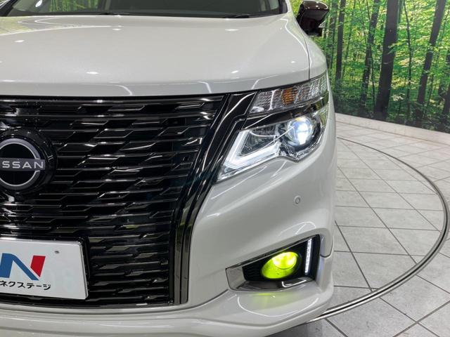 エルグランド ３５０ハイウェイスタープレミアムアーバンクロム　サンルーフ　後席モニター　メーカーナビ　両側電動スライド　全周囲カメラ　エマージェンシーブレーキ　レーダークルーズ　禁煙車　レザーシート　シートヒーター　パワーシート　ドラレコ　ＬＥＤヘッド　ＥＴＣ（65枚目）