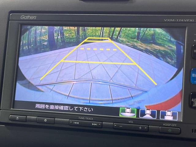 フリード G・ホンダセンシング 両側電動スライド 純正ナビ バックカメラ ホンダセンシング レーダークルーズ 禁煙車 ハーフレザーシート ドラレコ スマートキー LEDヘッド ETC 純正15インチアルミ オートライト(5枚目)