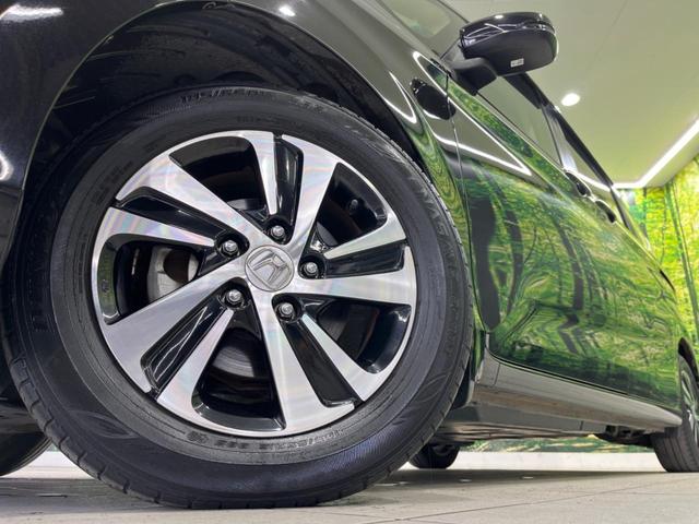 フリード G・ホンダセンシング 両側電動スライド 純正ナビ バックカメラ ホンダセンシング レーダークルーズ 禁煙車 ハーフレザーシート ドラレコ スマートキー LEDヘッド ETC 純正15インチアルミ オートライト(14枚目)