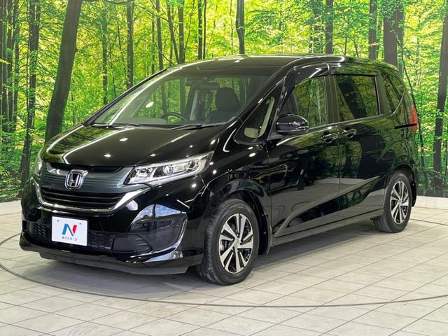 フリード G・ホンダセンシング 両側電動スライド 純正ナビ バックカメラ ホンダセンシング レーダークルーズ 禁煙車 ハーフレザーシート ドラレコ スマートキー LEDヘッド ETC 純正15インチアルミ オートライト(27枚目)