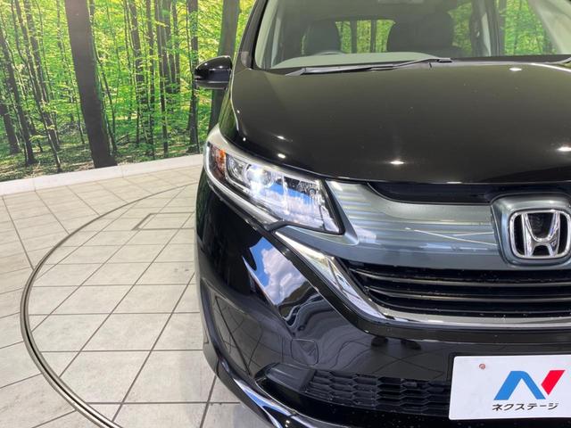 フリード G・ホンダセンシング 両側電動スライド 純正ナビ バックカメラ ホンダセンシング レーダークルーズ 禁煙車 ハーフレザーシート ドラレコ スマートキー LEDヘッド ETC 純正15インチアルミ オートライト(29枚目)