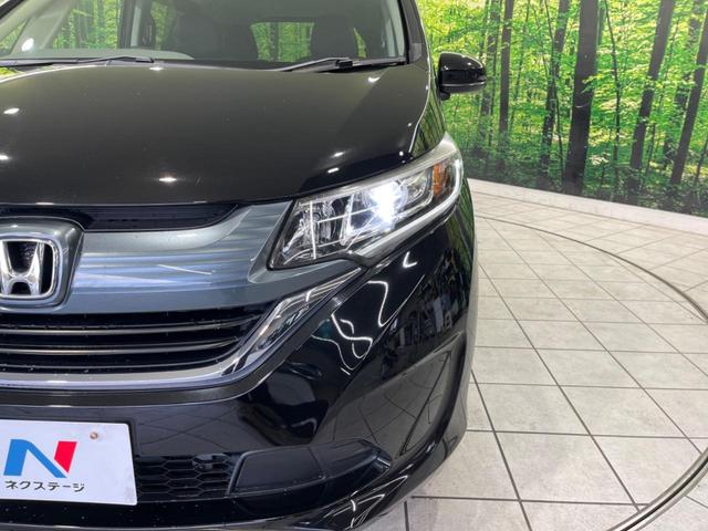 フリード G・ホンダセンシング 両側電動スライド 純正ナビ バックカメラ ホンダセンシング レーダークルーズ 禁煙車 ハーフレザーシート ドラレコ スマートキー LEDヘッド ETC 純正15インチアルミ オートライト(30枚目)
