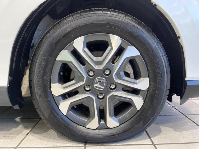 フリード+ハイブリッド ハイブリッド・クロスターホンダセンシング 両側電動ドア 純正9型ナビ バックカメラ ホンダセンシング レーダークルーズ 禁煙車 ハーフレザーシート ドラレコ スマートキー LEDヘッド ETC 純正15インチアルミ Bluetooth再生(31枚目)