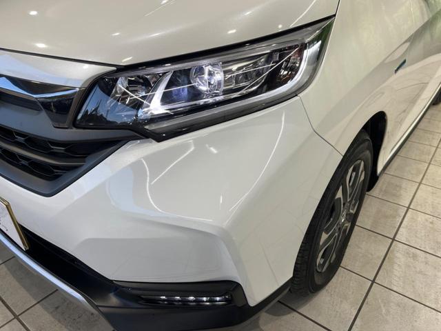 フリード+ハイブリッド ハイブリッド・クロスターホンダセンシング 両側電動ドア 純正9型ナビ バックカメラ ホンダセンシング レーダークルーズ 禁煙車 ハーフレザーシート ドラレコ スマートキー LEDヘッド ETC 純正15インチアルミ Bluetooth再生(32枚目)
