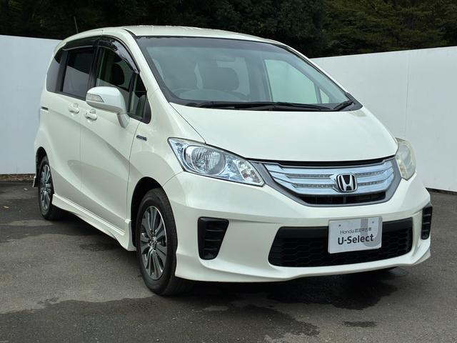 フリードハイブリッド ジャストセレクション ワンオーナー・7インチ純ナビTV・ETC・両パワスラ・スマートキー・HID・オートライト・純AW ナビテレビ セキュリティー 横滑り防止機能 記録簿 オートクルーズ エアバック DVD再生可能 PS(24枚目)