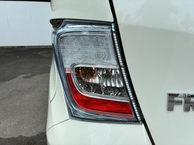 フリードハイブリッド ジャストセレクション ワンオーナー・7インチ純ナビTV・ETC・両パワスラ・スマートキー・HID・オートライト・純AW ナビテレビ セキュリティー 横滑り防止機能 記録簿 オートクルーズ エアバック DVD再生可能 PS(31枚目)