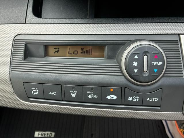 フリードハイブリッド ジャストセレクション ワンオーナー・7インチ純ナビTV・ETC・両パワスラ・スマートキー・HID・オートライト・純AW ナビテレビ セキュリティー 横滑り防止機能 記録簿 オートクルーズ エアバック DVD再生可能 PS(34枚目)