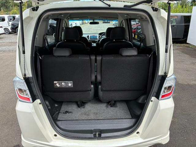 フリードハイブリッド ジャストセレクション ワンオーナー・7インチ純ナビTV・ETC・両パワスラ・スマートキー・HID・オートライト・純AW ナビテレビ セキュリティー 横滑り防止機能 記録簿 オートクルーズ エアバック DVD再生可能 PS(49枚目)