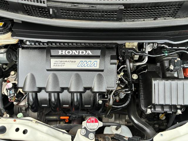 フリードハイブリッド ジャストセレクション ワンオーナー・7インチ純ナビTV・ETC・両パワスラ・スマートキー・HID・オートライト・純AW ナビテレビ セキュリティー 横滑り防止機能 記録簿 オートクルーズ エアバック DVD再生可能 PS(51枚目)