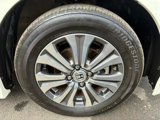 フリードハイブリッド ジャストセレクション ワンオーナー・7インチ純ナビTV・ETC・両パワスラ・スマートキー・HID・オートライト・純AW ナビテレビ セキュリティー 横滑り防止機能 記録簿 オートクルーズ エアバック DVD再生可能 PS(52枚目)