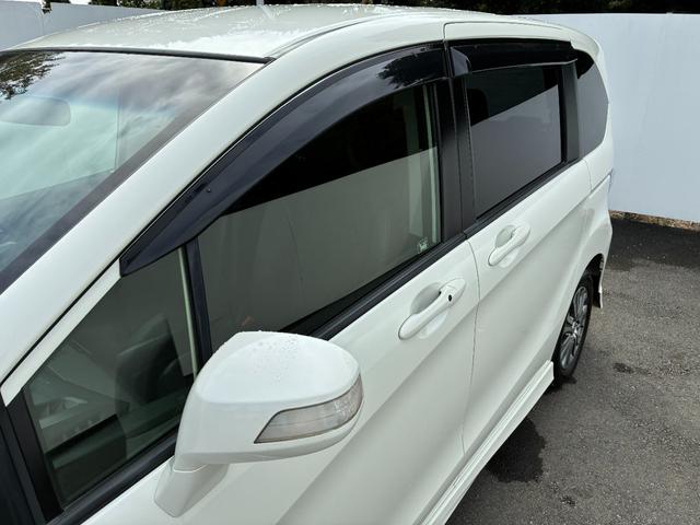 フリードハイブリッド ジャストセレクション ワンオーナー・7インチ純ナビTV・ETC・両パワスラ・スマートキー・HID・オートライト・純AW ナビテレビ セキュリティー 横滑り防止機能 記録簿 オートクルーズ エアバック DVD再生可能 PS(57枚目)