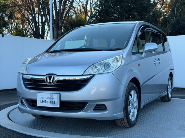 ステップワゴン GLパッケージ ワンオーナー・純ナビ・CD・DVD・左パワスラ・Rカメラ・HID・AW キーレスキー バックモニター パワーウインドウ 盗難防止装置 DVD再生 HDDナビ PS ABS エアバッグ 三列シート(17枚目)