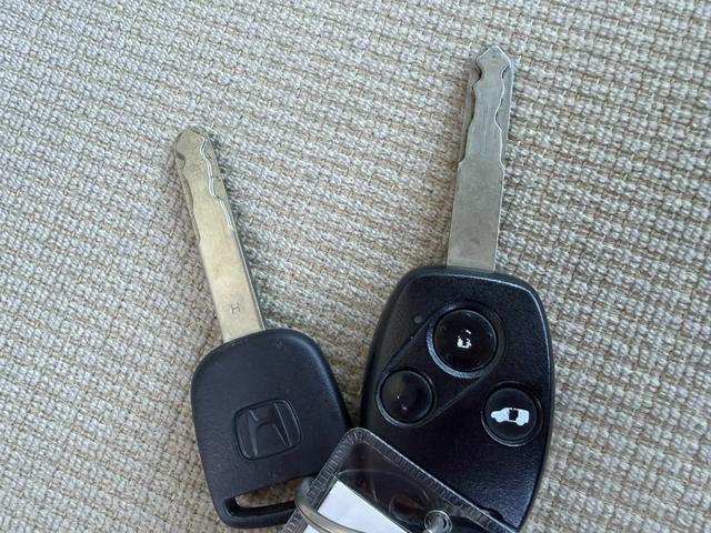 ステップワゴン GLパッケージ ワンオーナー・純ナビ・CD・DVD・左パワスラ・Rカメラ・HID・AW キーレスキー バックモニター パワーウインドウ 盗難防止装置 DVD再生 HDDナビ PS ABS エアバッグ 三列シート(62枚目)