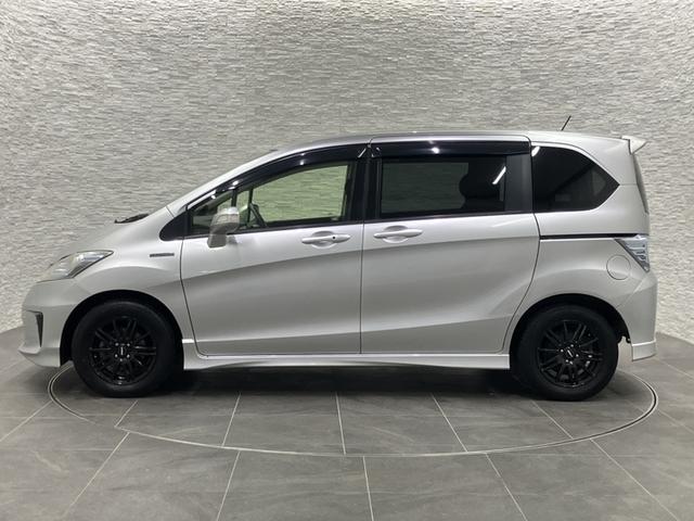 フリードハイブリッド ジャストセレクション　ワンオーナー　純正ナビ　フルセグＴＶ　Ｂｌｕｅｔｏｏｔｈ　バックカメラ　ＥＴＣ　片側電動スライドドア　クルーズコントロール　ＨＩＤヘッドライト　社外１５インチＡＷ　ウインカーミラー　スマートキー２個（32枚目）