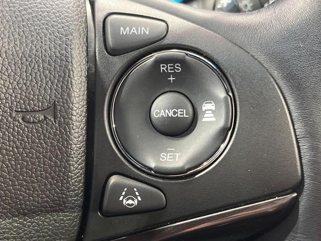 ヴェゼル ハイブリッドＲＳ・ホンダセンシング　ＳＤナビ　バックカメラ　衝突被害軽減システム　レーダークルーズ　禁煙車　ハーフレザーシート　スマートキー　ＬＥＤヘッド　ビルトインＥＴＣ　純正１８インチアルミ　オートライト　デュアルエアコン（7枚目）