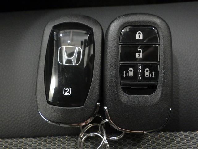 フリード e:HEVクロスター 禁煙車 ホンダコネクト LEDヘッドライト 両側電動スライドドア 純正ナビリアカメラ アルミホイール スマートキー 両席エアバック サイドカーテンエアバック ホンダセンシング ドライブレコーダー(15枚目)