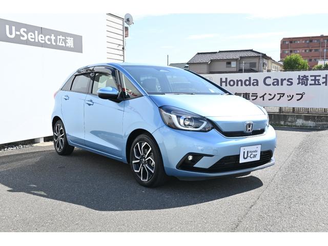 フィット e:HEVネス 雹害現状車 ホンダセンシング 純正9INナビ Rカメラ 2.0ETC FRドラレコ 障害物センサー アルミホイール LEDライト ホンダコネクト 衝突軽減 パーキングセンサー ワンオーナー 地デジ(6枚目)