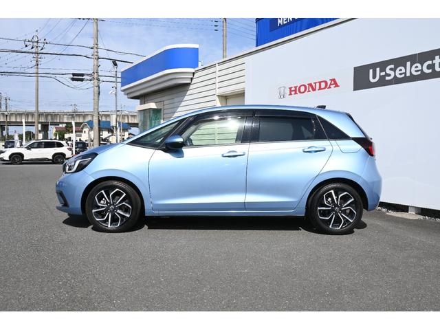 フィット e:HEVネス 雹害現状車 ホンダセンシング 純正9INナビ Rカメラ 2.0ETC FRドラレコ 障害物センサー アルミホイール LEDライト ホンダコネクト 衝突軽減 パーキングセンサー ワンオーナー 地デジ(8枚目)