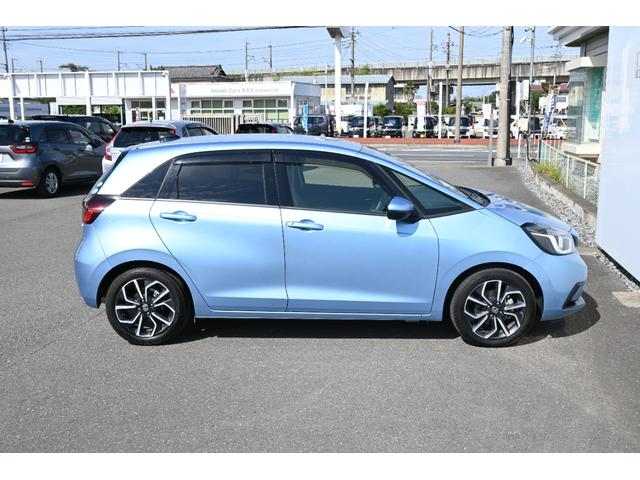 フィット e:HEVネス 雹害現状車 ホンダセンシング 純正9INナビ Rカメラ 2.0ETC FRドラレコ 障害物センサー アルミホイール LEDライト ホンダコネクト 衝突軽減 パーキングセンサー ワンオーナー 地デジ(9枚目)