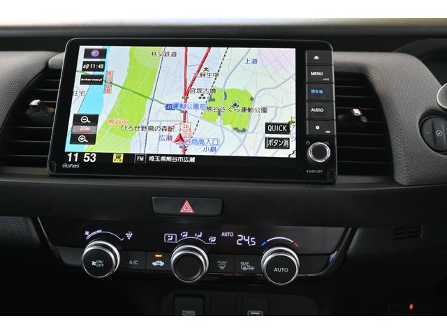 フィット e:HEVネス 雹害現状車 ホンダセンシング 純正9INナビ Rカメラ 2.0ETC FRドラレコ 障害物センサー アルミホイール LEDライト ホンダコネクト 衝突軽減 パーキングセンサー ワンオーナー 地デジ(14枚目)
